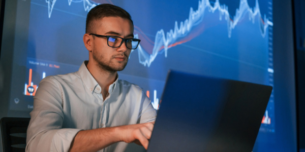 Man looking at Chart Growth