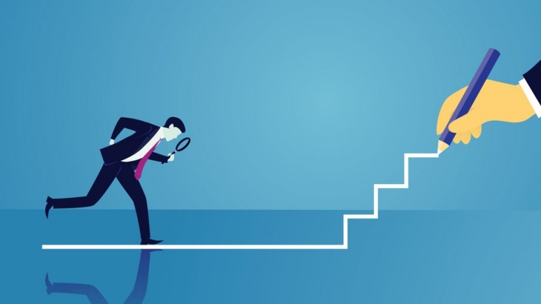 man looking with magnifying glass whilst another hand draws steps